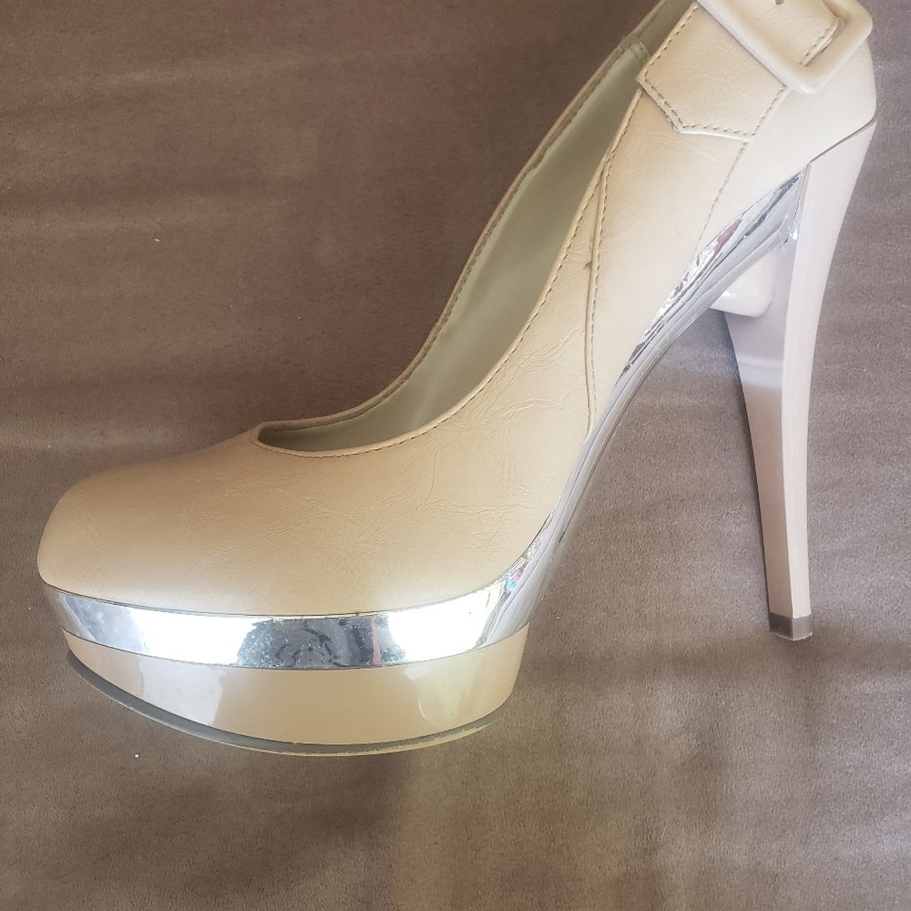 Michael Antonio tan and silver heels.